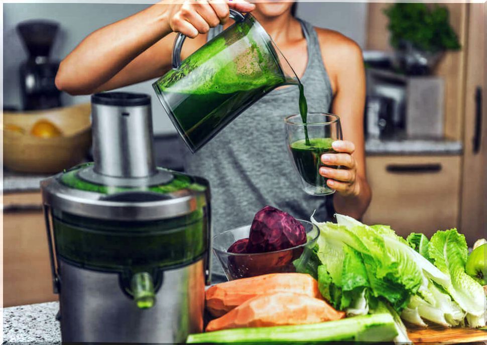 Girl preparing natural juices.