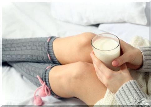 woman with glass of milk