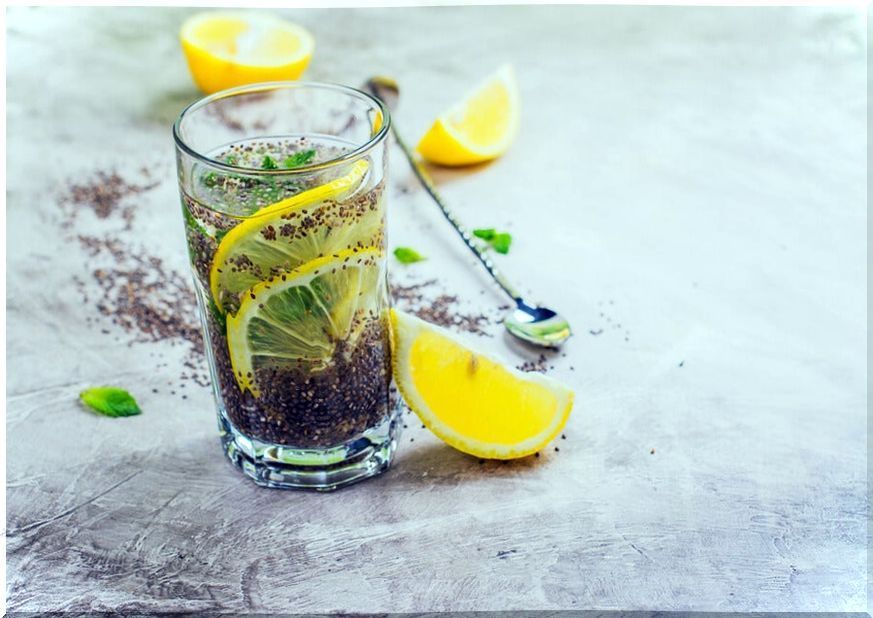 Glass of lemon juice with chia seeds.