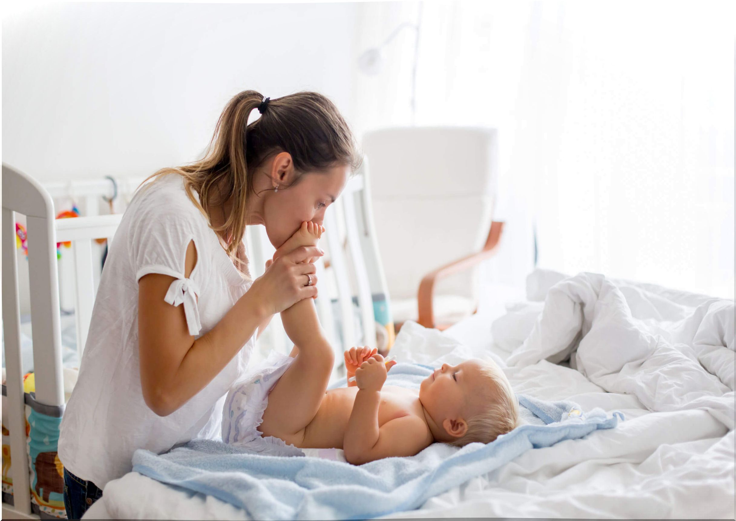 Is it advisable to wake up the baby to change the diaper?